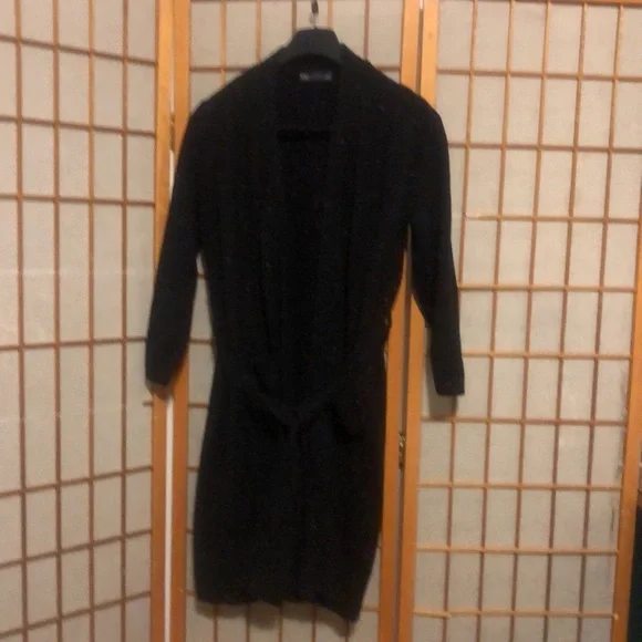 Long sweater jacket with belt.  Black with a few colored fabric spots. - Picture 3 of 7